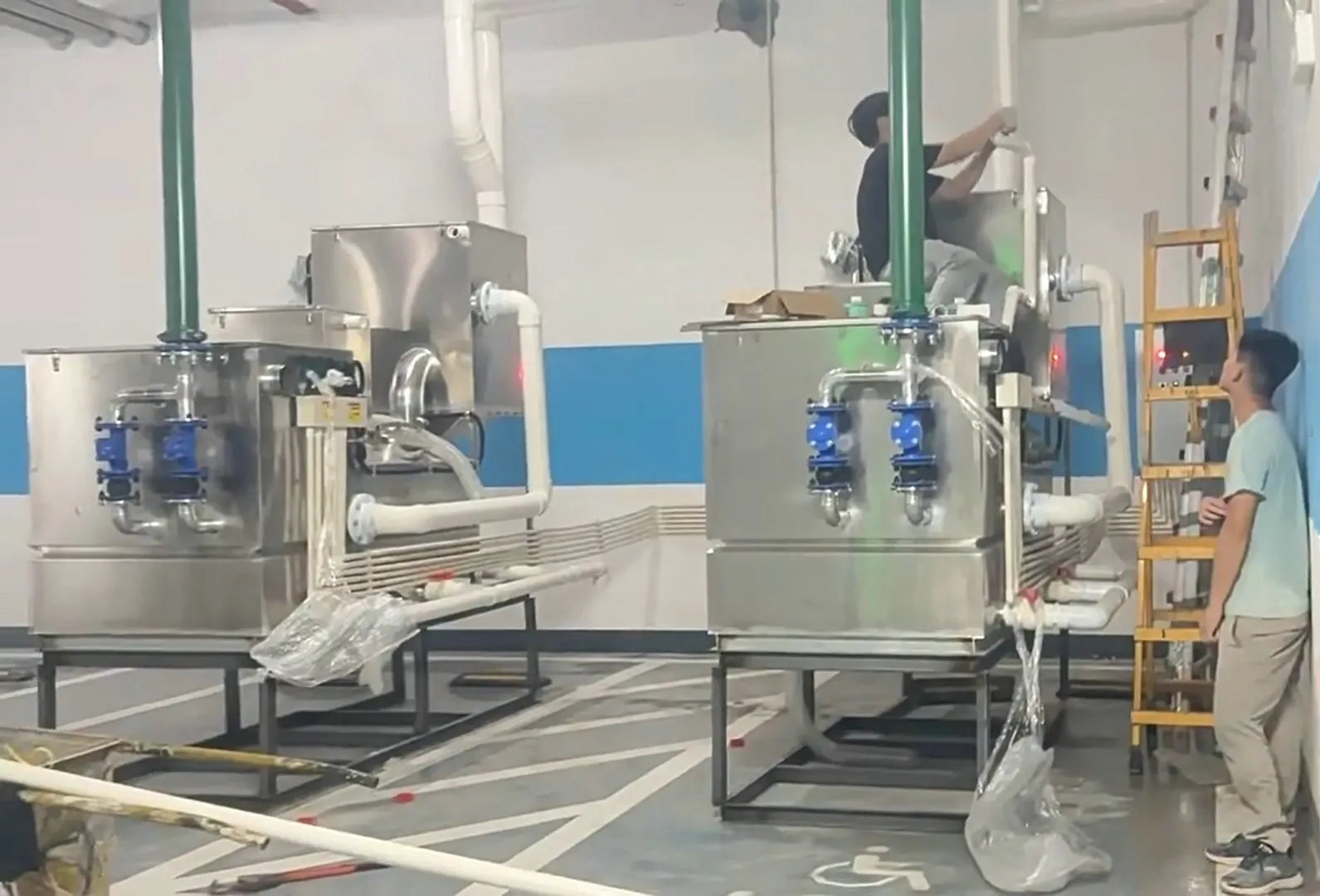Installation of two 30-cubic-meter fully automatic grease interceptors at the hotel's second basement level
